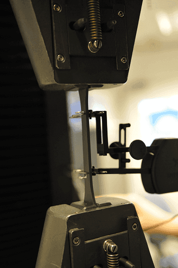 Tensile testing of a polymeric sample